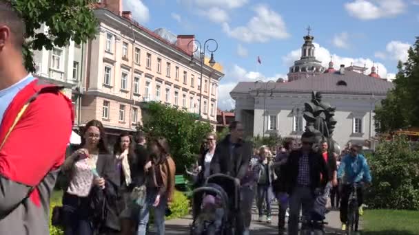 Soap bubble parade with people in city street — Stock Video