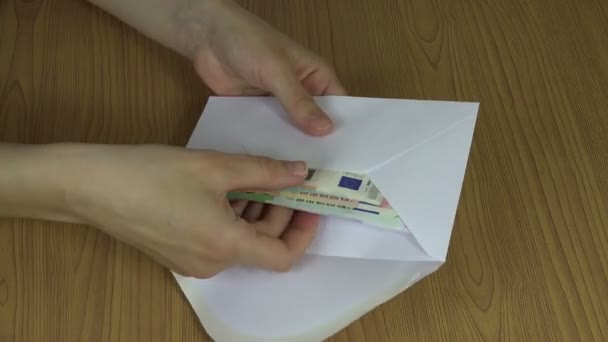 Woman hands count money cash euro banknotes from envelope. 4K