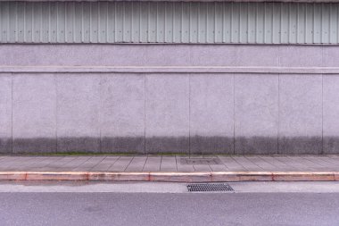 Sokak duvarı arka planı, endüstriyel arka plan, depo tuğla duvarlı boş Grunge şehir sokağı