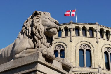 famous lion sculpture outside norwegian parliament in oslo
