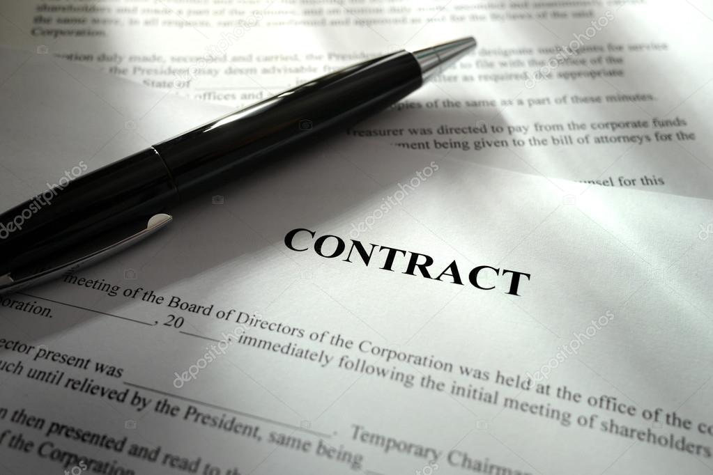 black pen on a contract
