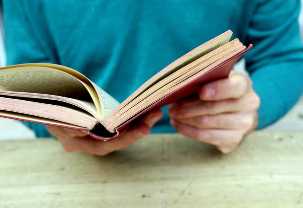 Close up of man reading a book — Stock Photo, Image