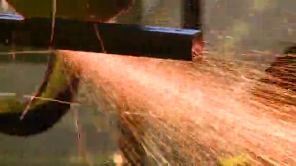 Grinder and sparks in a steel factory — Stock Video