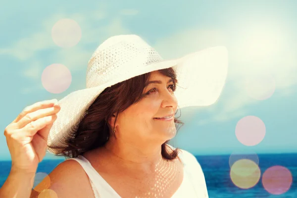 Senior woman on the beach — Stock Photo, Image