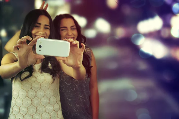 Friends making selfie. Two beautiful young women making "selfie" — Stock Photo, Image