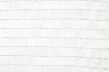 Süveter ya da atkı renginde büyük bir örgü. Örgü arka plan. Yünlü el yapımı araba.