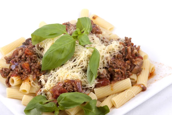 Rigatoni con salsa boloñesa —  Fotos de Stock