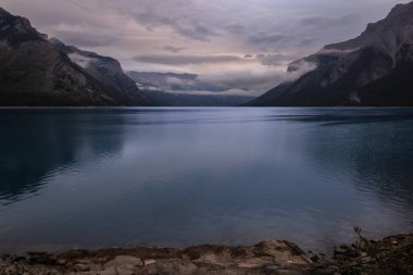 Dramatic sunrise at Lake Minnewanka in Banff National Park, Alberta Canada.