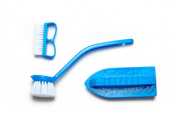Cleaning brushes on a white background. Cleaning and cleaning. Isolated background. Copy Space