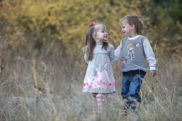 Boy embraces girl — Stock Photo, Image