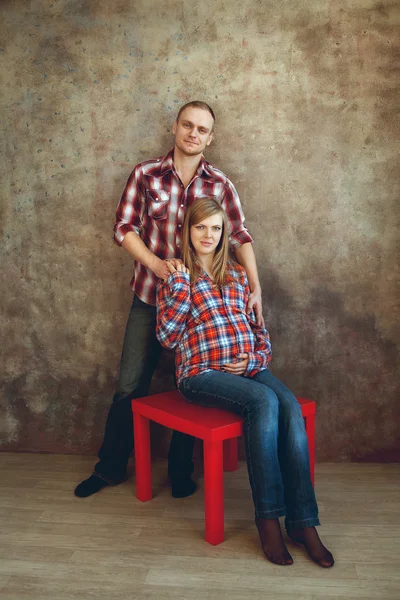 Pregnant woman with her husband — Stock Photo, Image