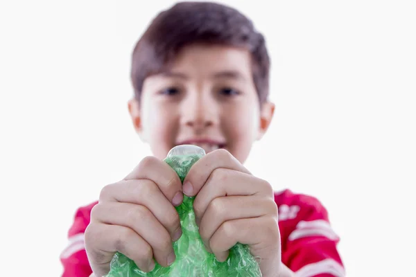 Boy holding bubble wrap. — Stock Photo, Image