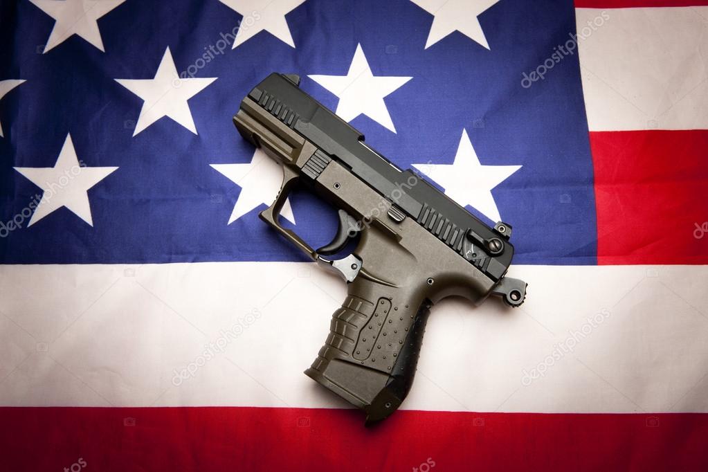  Concept of pistol on the flag.