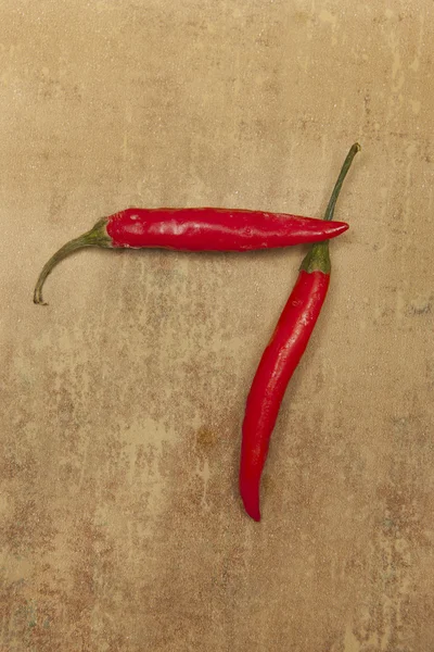 Número 7 de pimentas vermelhas . — Fotografia de Stock