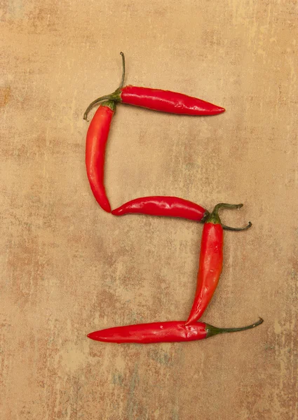 Number 5  from red peppers. — Stock Photo, Image