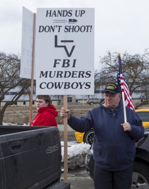 Elinde siyasi miting.