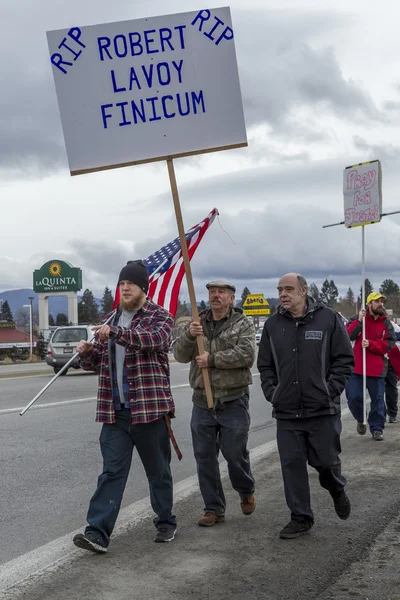 Walking along the road with signs. — Stock Photo, Image