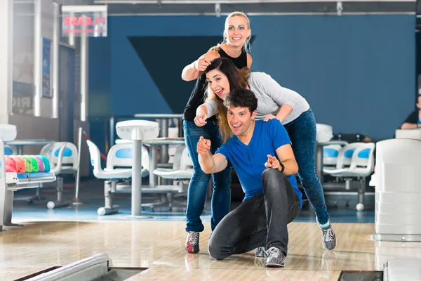 Friends bowling having fun — Stock Photo, Image