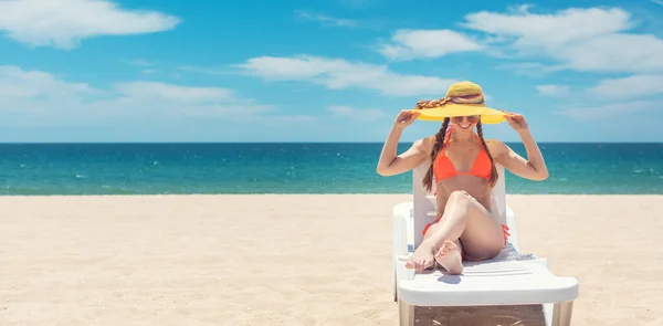 Banner of woman tanning on the beach by the sea in her vacation — Stock Photo, Image