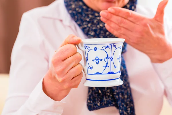 Senior woman drinking tea — Stock Photo, Image