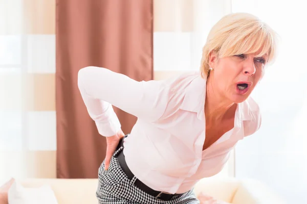 Senior woman having back pain — Stock Photo, Image