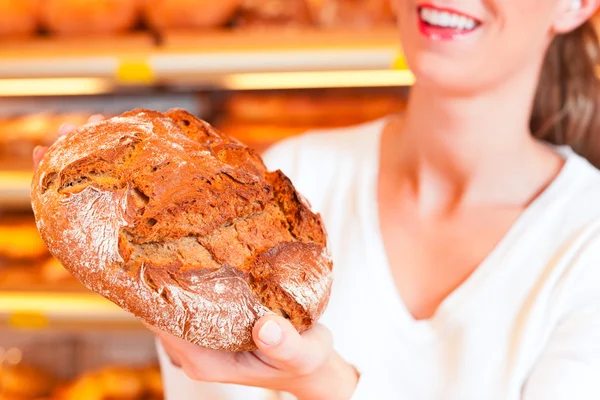 Ženské baker ve své pekárně — Stock fotografie