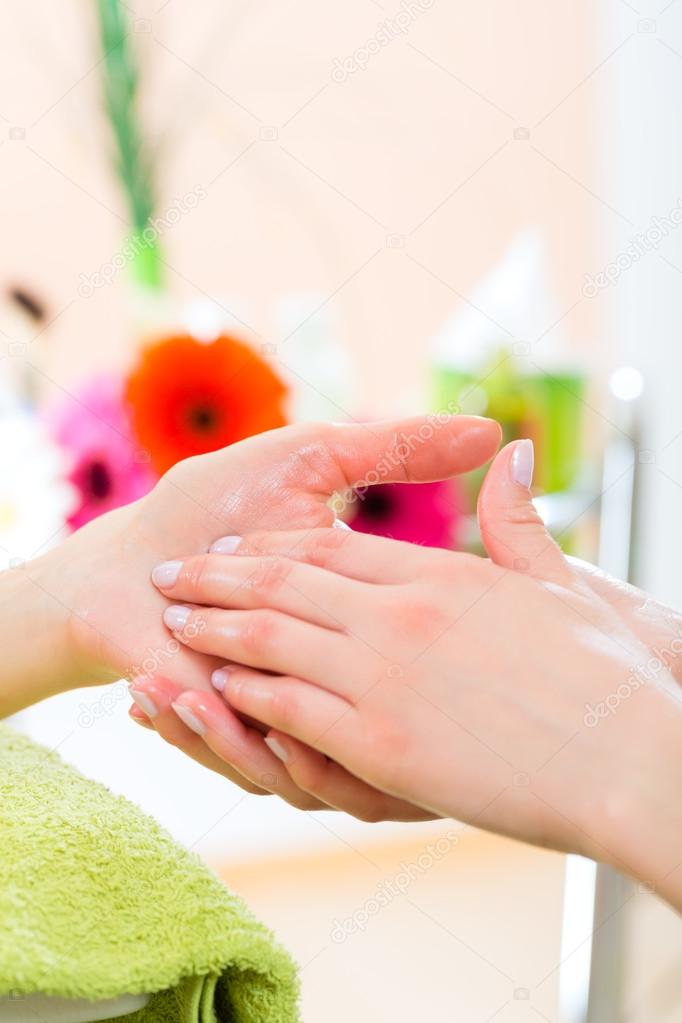 Woman  receiving hand massage