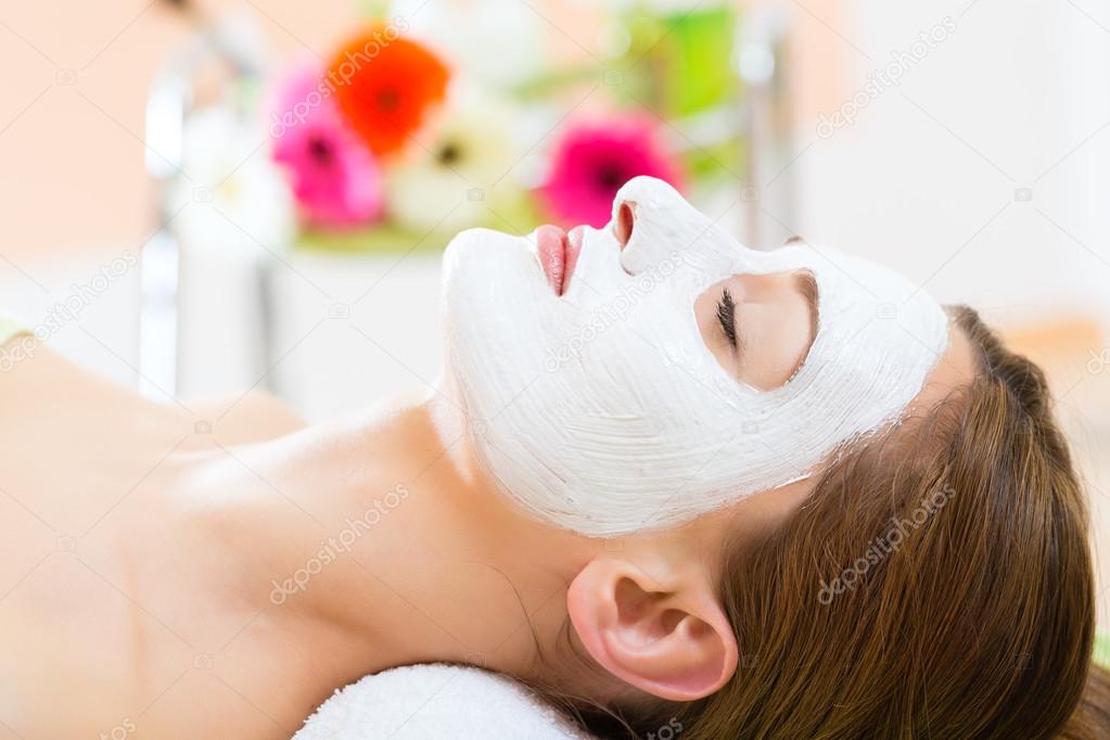 Woman getting face mask