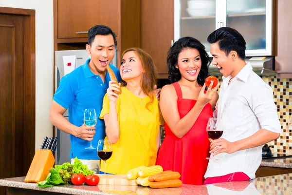 Asian friends cooking — Stock Photo, Image