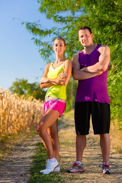 Uomo e donna in corsa per lo sport — Foto Stock