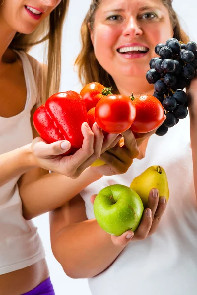 Gezond eten - vrouwen, fruit en groenten — Stockfoto