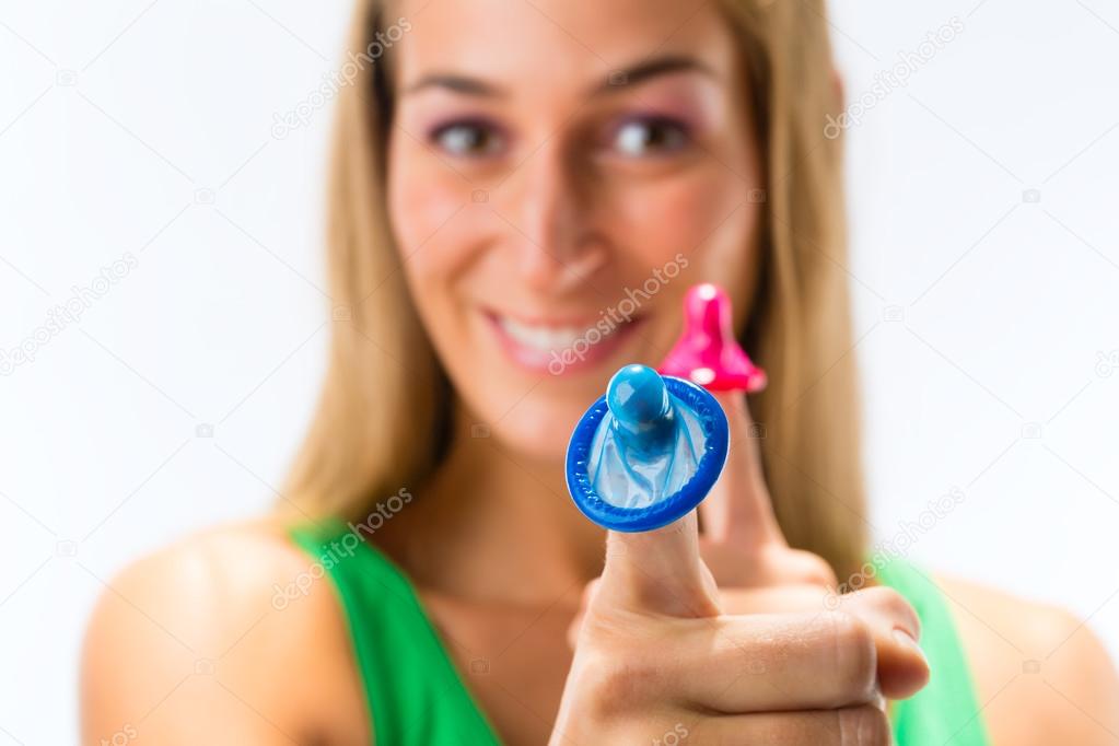 Young woman with  condoms