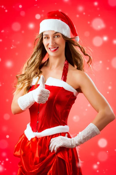 Woman in Santa Claus costume Stock Image