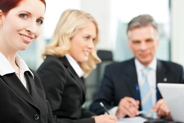 Business people - team meeting in an office — Stock Photo, Image