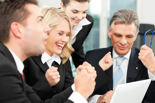 Business people - team meeting in an office — Stock Photo, Image