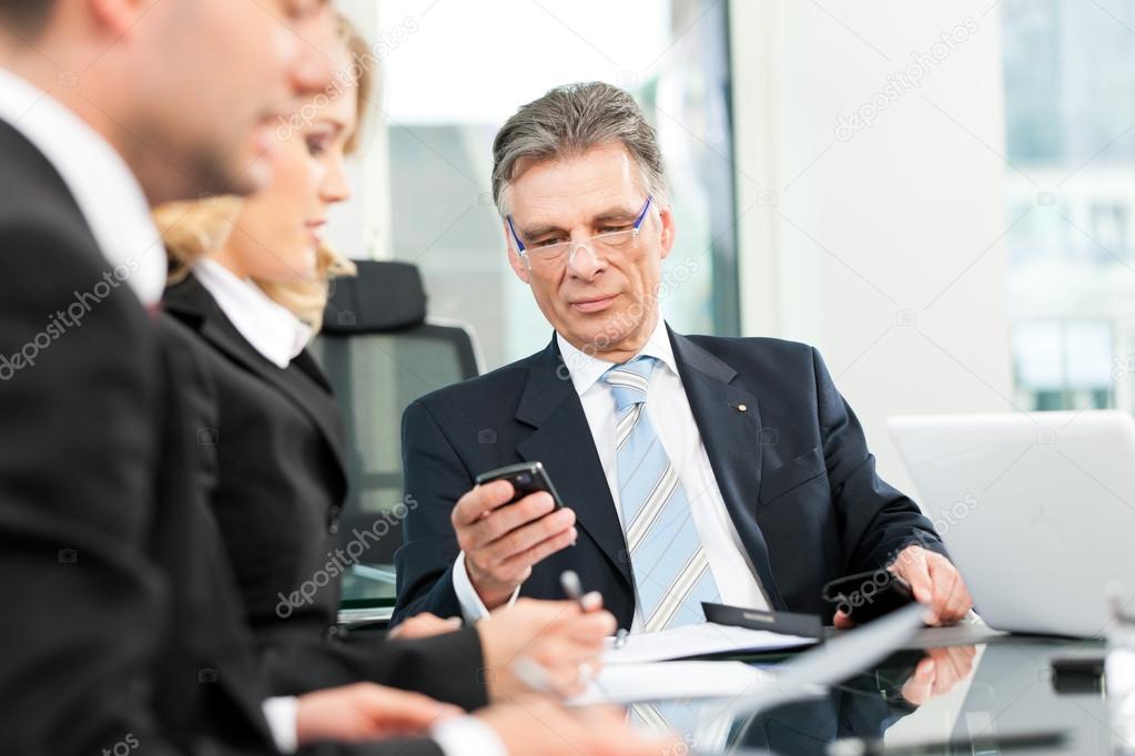 Business - team meeting in an office