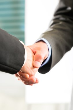 Business people doing Handshake clipart