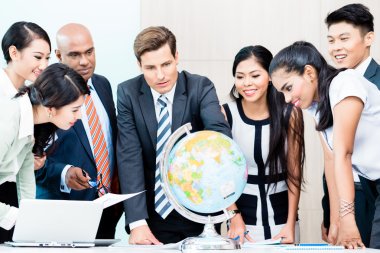 Business team - global market intelligence clipart