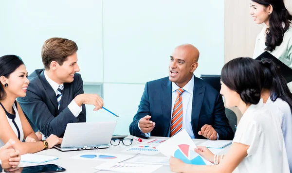 Diversity team in business development meeting — Stock Photo, Image