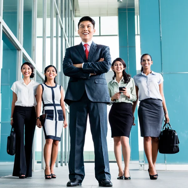 Asian business team marching — Stock Photo, Image