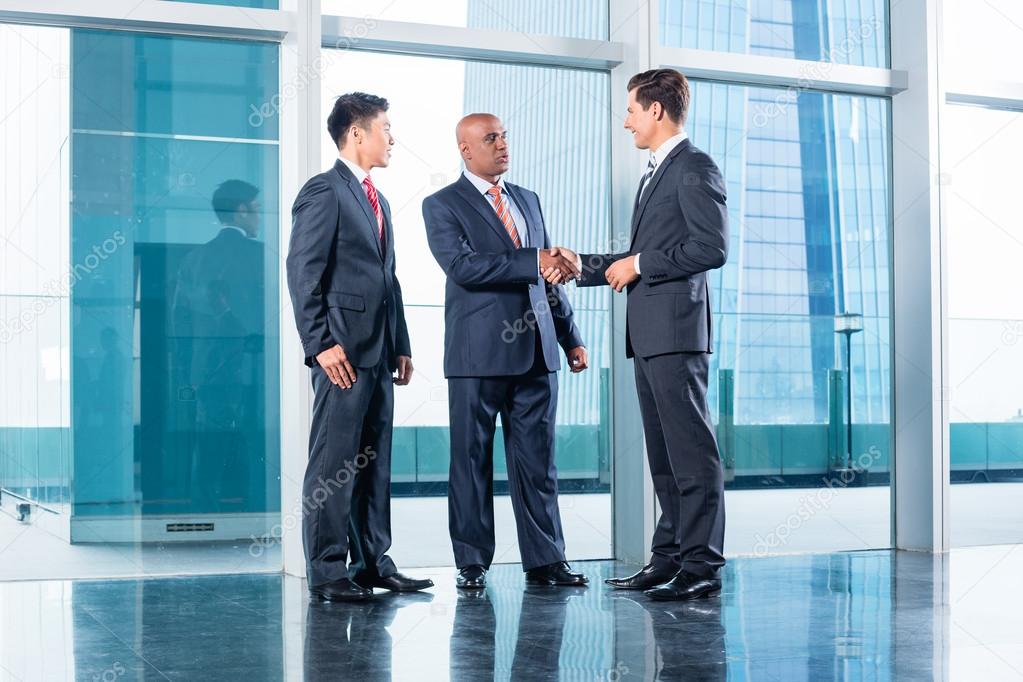 Business team having agreement and handshake