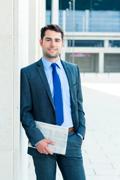 Businessman reading  business newspaper — Stock Photo, Image