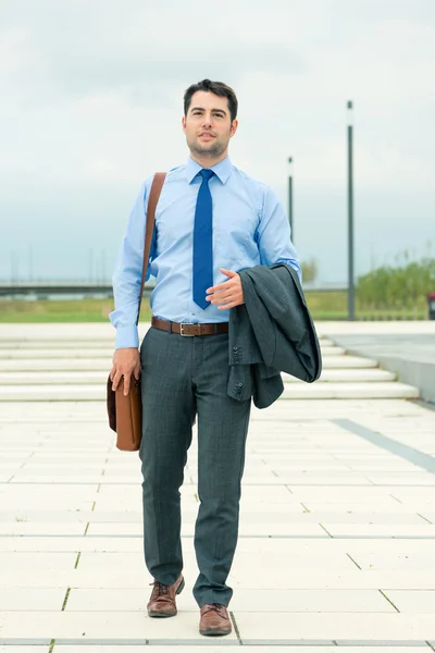 Handsome businessman or manager going home — Stock Photo, Image