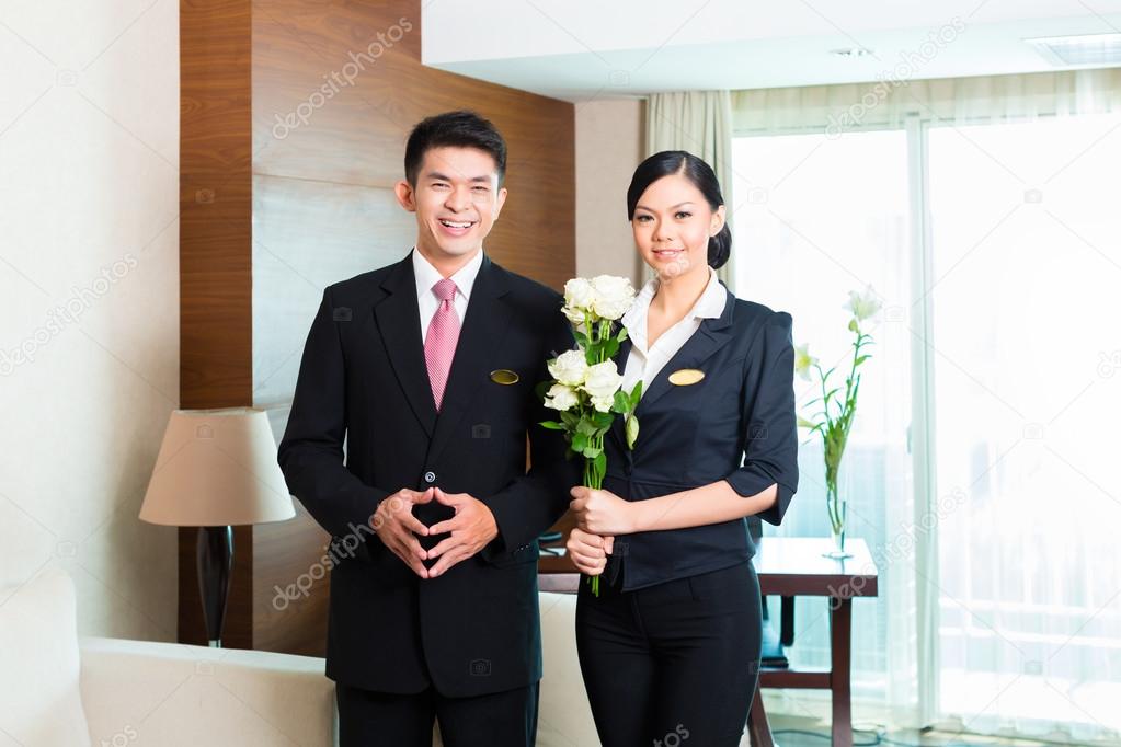 hotel manager welcoming VIP guests