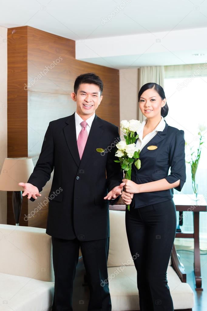 hotel manager welcoming VIP guests