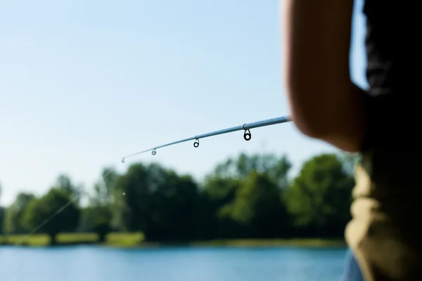 Fishing at the lake — Stock Photo, Image