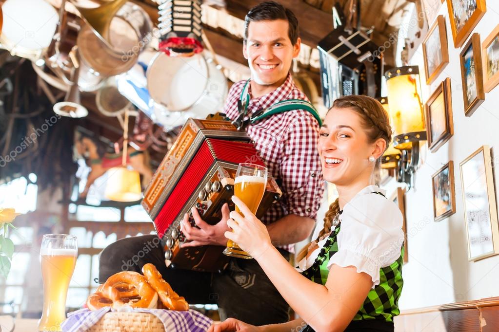 Musician in Bavarian Restaurant playing Accordion