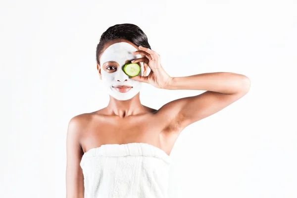 Beautiful African woman in Studio with facial mask — Stock Photo, Image