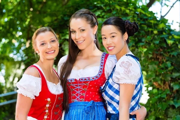 Friends in traditional clothes in bavaria — Stock Photo, Image