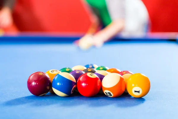 People playing pool billiard game — Stock Photo, Image